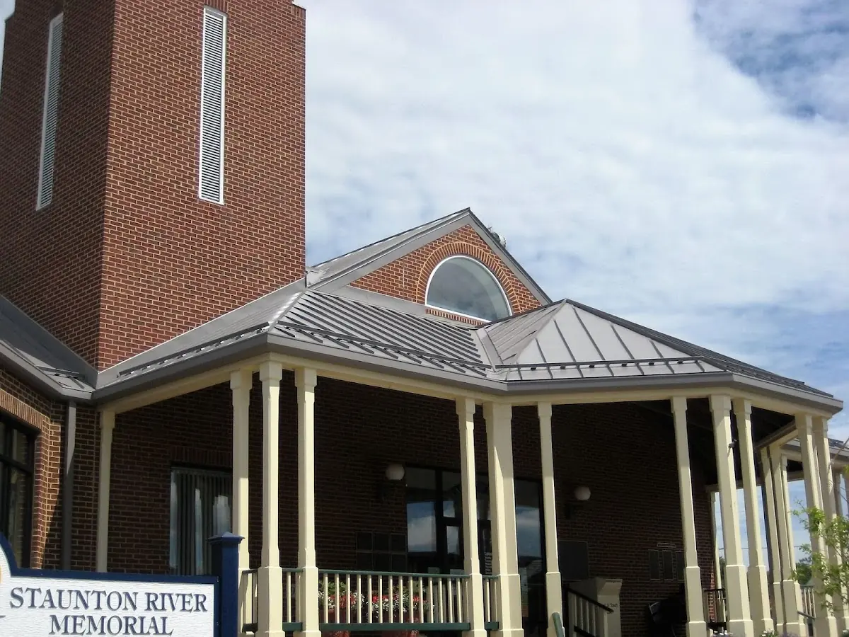 Skilled roofing craftsmen working on a residential roof in Downtown Bridgeport